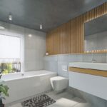 une salle de bain avec toilettes, lavabo et baignoire